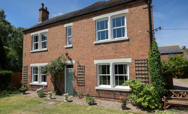 White Sash Windows On Whole House